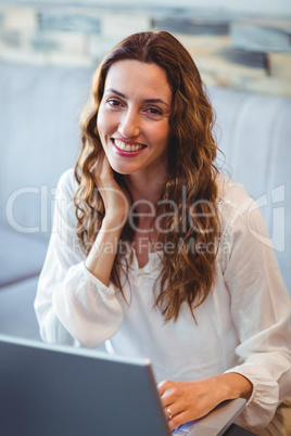 Young woman using laptop