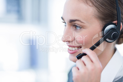 Close up view of happy businesswoman with headset
