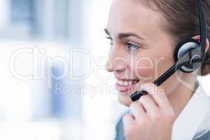 Close up view of happy businesswoman with headset