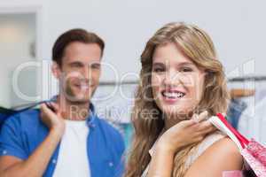 Portrait of a happy couple with shopping bags