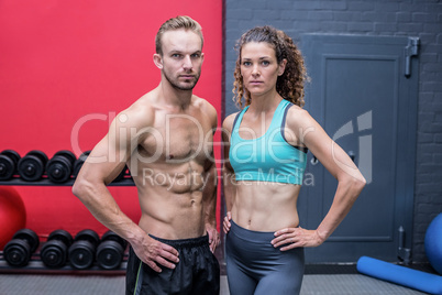 Muscular couple looking at the camera