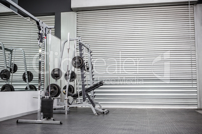 Exercise room with shutters and mirrors