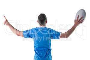 Rugby player gesturing with hands