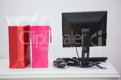 Two shopping bags on a counter