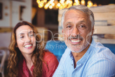 Cute couple smiling at the camera