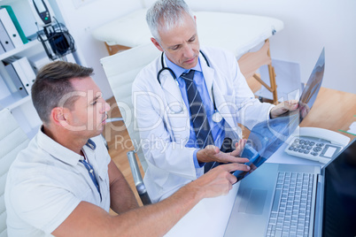 Doctor and patient looking at Xray