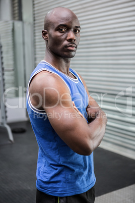 Young Bodybuilder in shirt looking at the camera