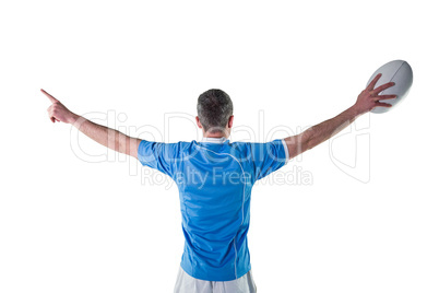 Rugby player gesturing with hands