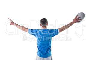 Rugby player gesturing with hands