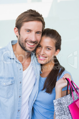 Young happy couple looking at the camera