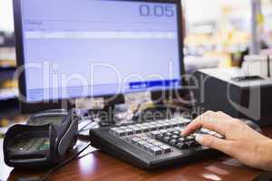 Hand of woman using computer