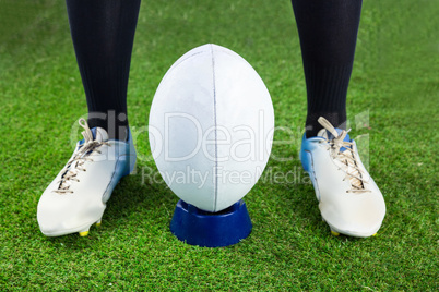 Rugby player ready to make a drop kick