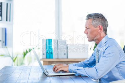 Businessman working with laptop computer