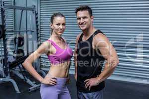 Muscular couple looking at the camera