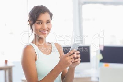 Smiling businesswoman at work