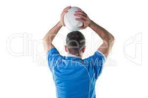 Rugby player about to throw a rugby ball