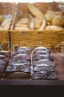 Close up of basket with fresh bread and pastry