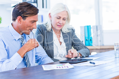 Business people working on tablet computer