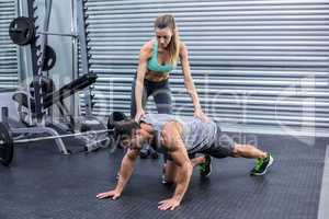 Muscular man on a plank position