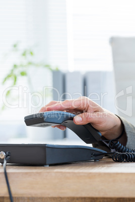 Businessman answer the phone