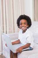 Portrait of a little boy using a laptop