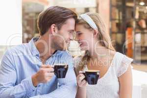 Cute couple drinking a coffee together