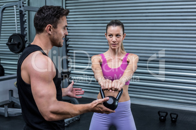 A muscular couple discussing together