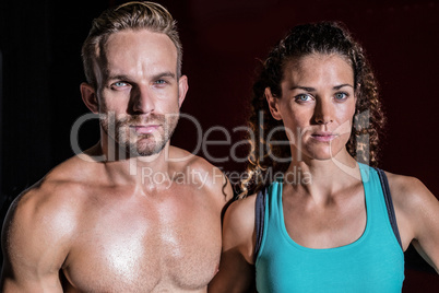 Muscular couple looking at the camera