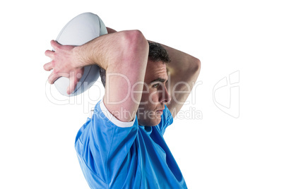 Rugby player about to throw a rugby ball