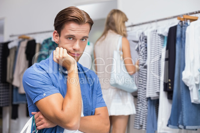 A bored man with his hand under his chin