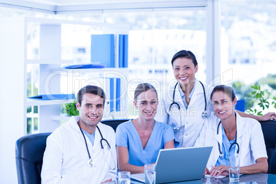 Team of doctors smiling at camera