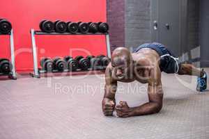 Young bodybuilder doing excercises