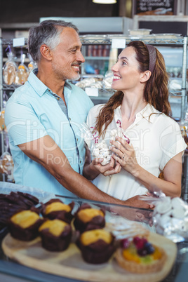 Cute couple standing arm around