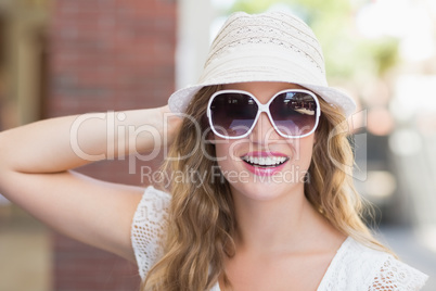 Pretty hipster woman enjoying the sun