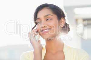 Casual businesswoman talking on phone