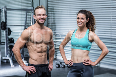 Muscular couple looking at the camera