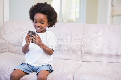 A little boy using a technology
