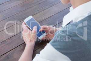 Close up view of businesswoman using her smartphone