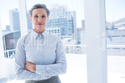 Businesswoman looking at the camera in the office