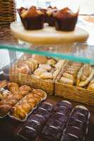 Close up of basket with fresh bread and pastry