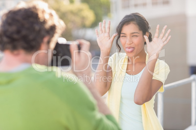 couple taking photos of themselves