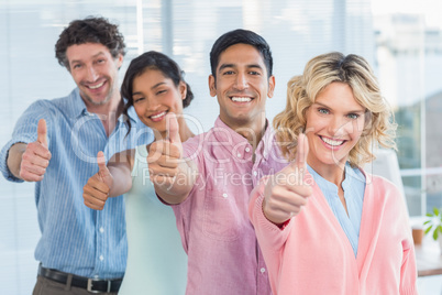 casual businesspeople thumbs up in line