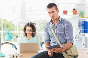 Creative businessman using digital tablet