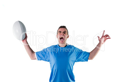A rugby player gesturing victory