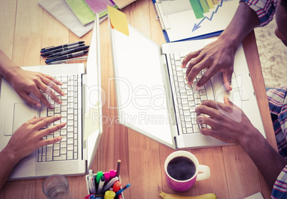 Young business people working at the laptops