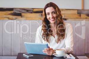 Woman using digital tablet