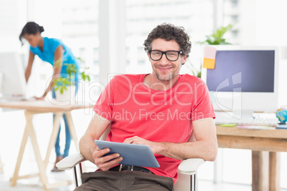 Man posing in front of his colleague