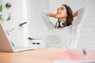 Young businesswoman relaxes in the office
