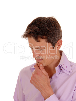 Closeup of a thinking young man.