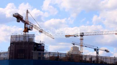 tower cranes building a house